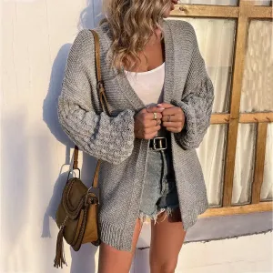 Elegant Oversized Knit Cardigan with Stylish Lantern Sleeves and Practical Pockets